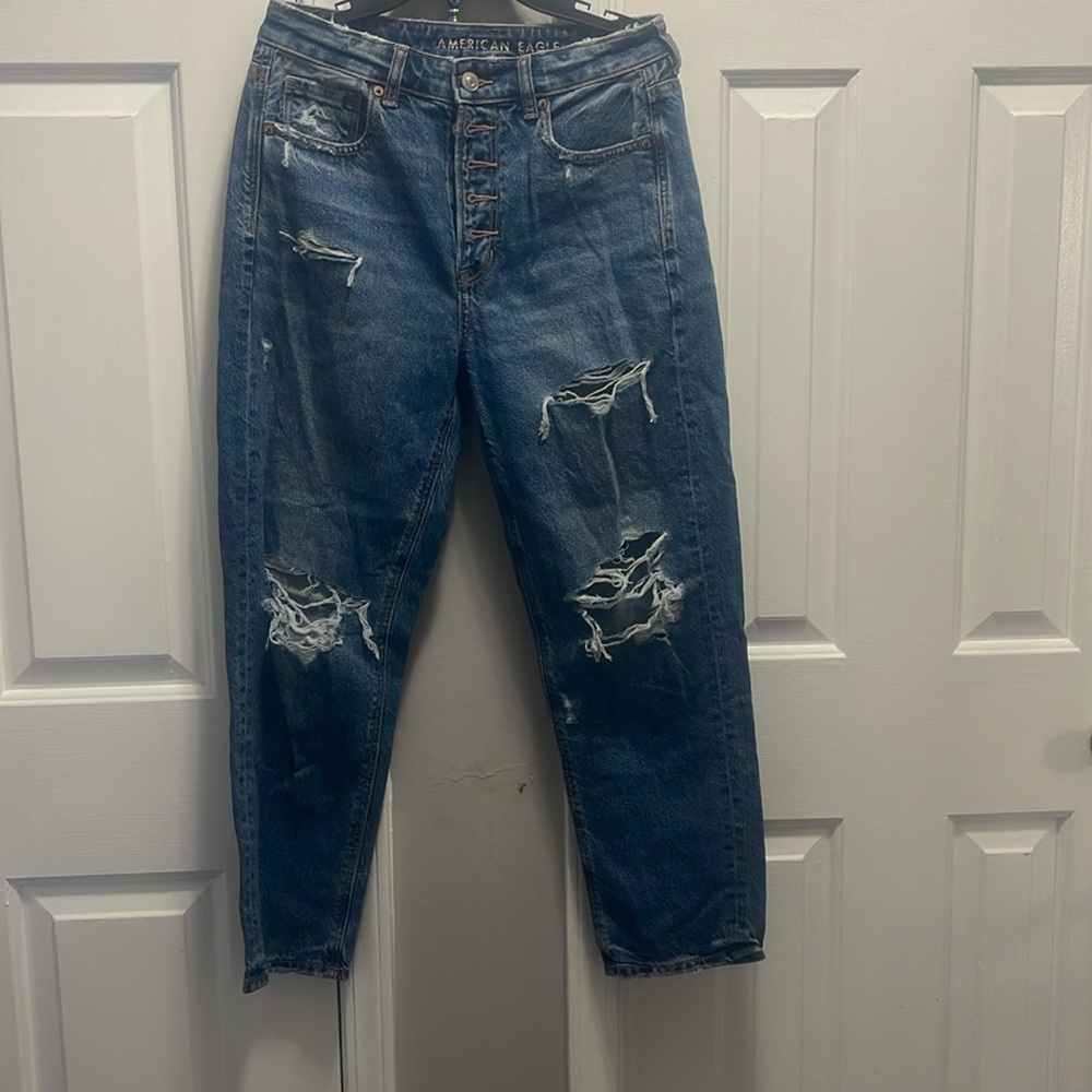 Distressed blue jeans